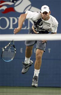 Andy Roddick of the USA serves to Rafael Nadal of Spain during the US Open