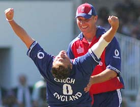 England's Darren Gough  celebrates with Alex Wharf after dismissing Harbhajan Singh 