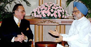 Prime Minister Manmohan Singh with Pakistan Foreign Minister Khurshid Mehmood Kasuri in New Delhi on Monday.