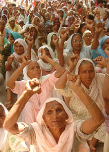 Members of the Dehati Majdoor Sabha, Punjab, hold a protest against the non-payment of old-age pension, in Amritsar on Monday.