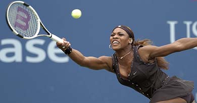 Serena Williams hits a return to Patty Schnyder during the US Open