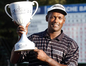 Vijay Singh holds aloft his trophy after he won the final round of the Deutsche Bank Championship in Norton, Massachusetts