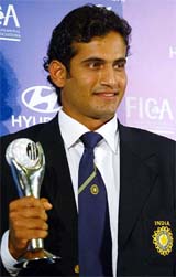 Irfan Pathan holds his award after being named Emerging Player of the Year during the ICC Awards ceremony at Alexandra Palace in London on Tuesday. 