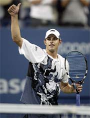Andy Roddick of the USA celebrates his win over Tommy Robredo of Spain at the US Open in New York on Tuesday