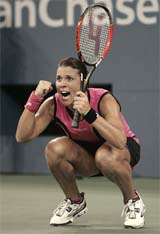 US tennis star Jennifer Capriati exults during her quarterfinal match against compatriot Serena Williams