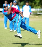 Team captain Richard Staple throws a ball during the USA cricket team's practice