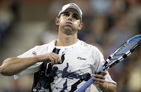 Andy Roddick reacts after losing a point to Joachim Johansson during their quarterfinal match at the US