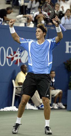 Joachim Johansson celebrates his win over Andy Roddick at the US Open