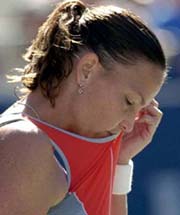 Lindsay Davenport of the USA reacts after losing a point during her semifinal match against Svetlana Kuznetsova of Russia at the US Open on Friday