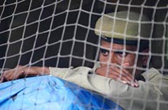 A soldier in a pensive mood after two of his colleagues were killed in an encounter with militants in central Srinagar on Sunday.