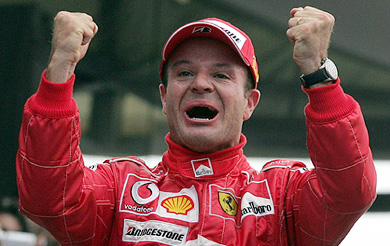 Ferrari's Brazilian driver Rubens Barrichello celebrates after winning the Italian Grand Prix 
