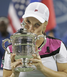 Svetlana Kuznetsova of Russia kisses the trophy after winning the US Open women's singles title