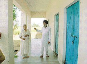 Mr Hari Singh, lambardar, points out to a closed Government Primary School at Chak Jindra, near Moga, on Monday because of shortage of teachers.