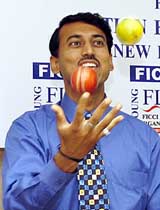 Olympic silver medalist, Major Rajyavardhan Rathore, juggles balls after a panel discussion on 'Nation Building Through Sports'
