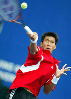 Paradorn Srichaphan of Thailand returns a forehand to Jean-Rene Lisnard of France
