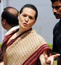 Congress President Sonia Gandhi addresses a press conference at ITI guest house, Rai Bareli, in Uttar Pradesh on Thursday.
