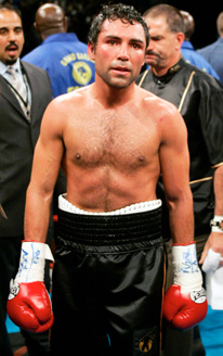 Oscar De La Hoya looks dejected after being knocked out by Bernard Hopkins 