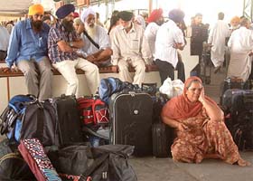Members of the Sikh jatha awaiting Customs clearance at Attari railway station in Amritsar