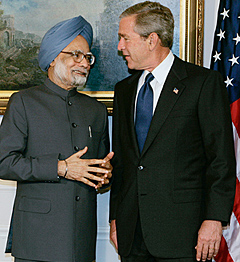 Prime Minister Manmohan Singh with US President George W. Bush at Hotel Waldorf-Astoria in New York on Tuesday.