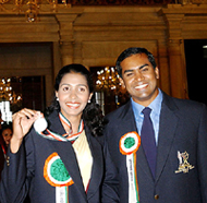 Long jumper Anju Bobby George, winner of the Rajiv Gandhi Khel Ratna Award, with her husband and trainer Robert Bobby George
