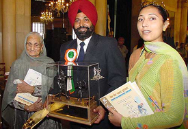 Former India hockey Coach Rajinder Singh with his family members after receiving the Arjuna Award