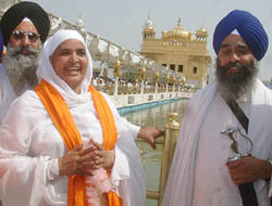Bibi Jagir Kaur is all smiles in front of the Golden Temple in Amritsar on Thursday.