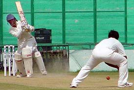 Venugopal Rao drives Ramesh Powar during his knock of 113 on the third day of the Irani Trophy final between the Rest of India and Mumbai