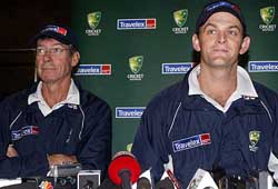 Stand-in Australian captain Adam Gilchrist and coach John Buchanan attend a news conference