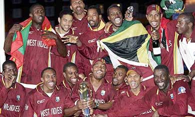 West Indies players pose with the Champions Trophy after beating England