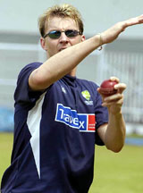 Australian pace bowler Brett Lee warms up at the Brabourne Stadium in Mumbai