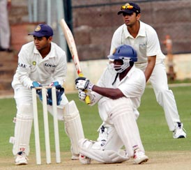 India A batsman Sridharan Sriram hits a shot during his unbeaten knock of 110 against India Seniors