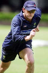 Stand-in Australian skipper Adam Gilchrist runs during a training session in Mumbai on Tuesday