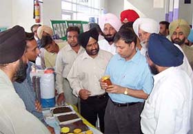 Deputy Commissioner Alok Shekhar at an exhibition organised as part of a farmers� training camp in Faridkot