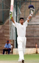 Mohammad Kaif of India A team waves at spectators after completing his century against India seniors