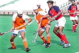 Namdhari XI players fight for the ball with Gagan Ajit Singh