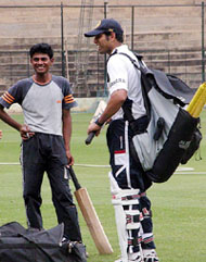 Indian cricketer VVS Laxman talking to a fan at the Chinnaswamy stadium in Bangalore