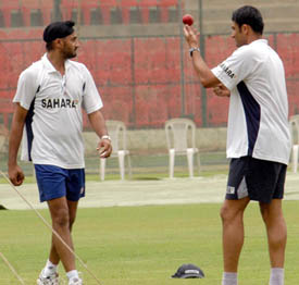 Indian spinners Anil Kumble and Harbhajan Singh during a practice session at the Chinnaswamy stadium 