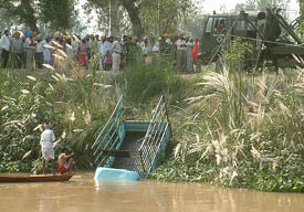 The canter which fell into the Rajasthan Feeder, near Harike Barrage, being fished out by Army personnel on Tuesday. 