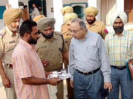 The Adviser to the Jail Department, Punjab, Mr A.P. Bhatnagar, inspects the Moga jail on Tuesday. 