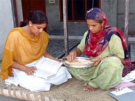 Jasbir Kaur along with her elder daughter at her home in Indergarh