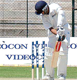 Rahul Dravid is bowled by Glenn McGrath on the second day of the first Test between India and Australia in Bangalore