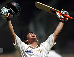 Australian skipper Adam Gilchrist celebrates his century