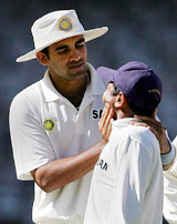 Zaheer Khan jokes with team-mate Parthiv Patel during the third day�s play of the first Test between India and Australia