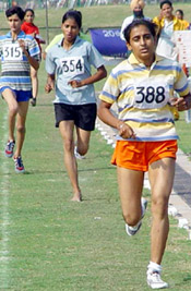 Sunita Bamal of Hisar wins the 800m at the 20th Haryana State Sports Meet being held at Tau Devi Lal Sports Complex