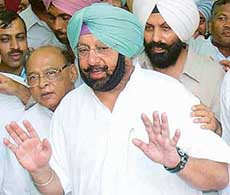 Punjab Chief Minister Amarinder Singh comes out of the District Courts after charges were framed against him in a defamation case in Chandigarh on Saturday.