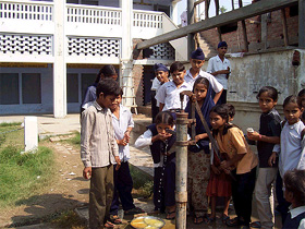 Schoolchildren drinking contaminated water at one of the senior secondary schools of Kurali.