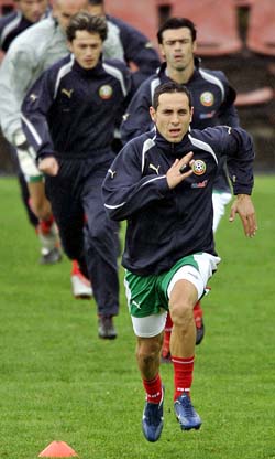 Bulgarian soccer team striker Martin Petrov runs ahead of team-mates during a team practice session in Sofia on Monday. Bulgaria will meet Malta on Wednesday