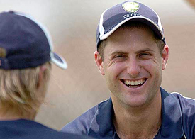 Australian batsman Simon Katich shares a light moment with a teammate