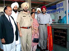 DIG H.S. Randhawa inaugurates a single-window service while SSP M.S. Chhina looks on at the Community Police Resource Centre in Moga on Friday. 