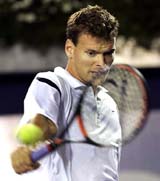Dutch Sjeng Schalken returns the ball to Austria's Stefan Koubek